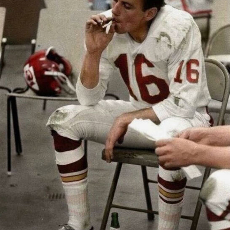 football player smoking a cigarette