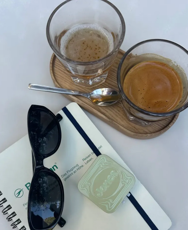 coffee, sunglasses, jones mint tin
