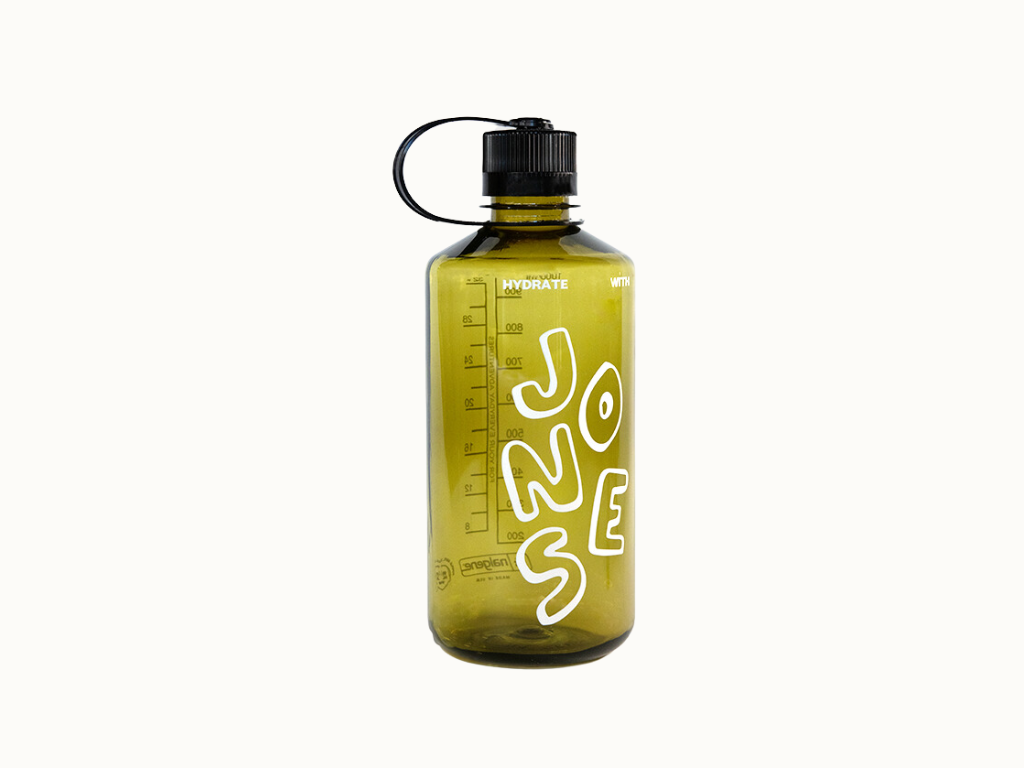 The Jones 32oz Nalgene by Quit with Jones is a translucent olive green recycled plastic water bottle with a black loop-handle screw cap and white graffiti text reading "JUNE JOSE.