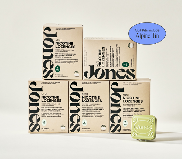 Two tan-colored Jones Sampler boxes are shown—one upright with a green lozenge container on top, the other leaning beside it. Text highlights the Jones brand name, 2mg nicotine mints, and mint flavor.