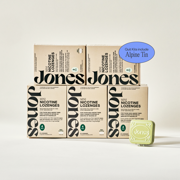 Two tan-colored Jones Sampler boxes are shown—one upright with a green lozenge container on top, the other leaning beside it. Text highlights the Jones brand name, 2mg nicotine mints, and mint flavor.