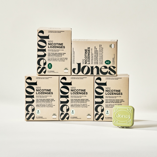 Two tan-colored Jones Sampler boxes are shown—one upright with a green lozenge container on top, the other leaning beside it. Text highlights the Jones brand name, 2mg nicotine mints, and mint flavor.