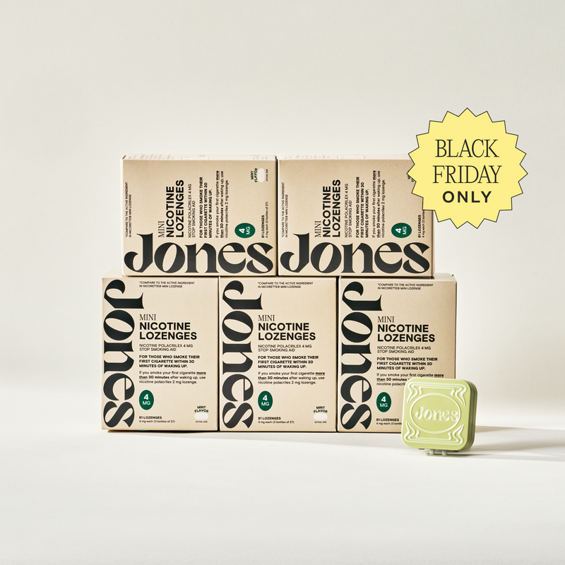 Four boxes of Jones (OLD) Switcher Upper lozenges are stacked, with one tin on top. Each box features bold black branding and product details, making them perfect for cravings support.