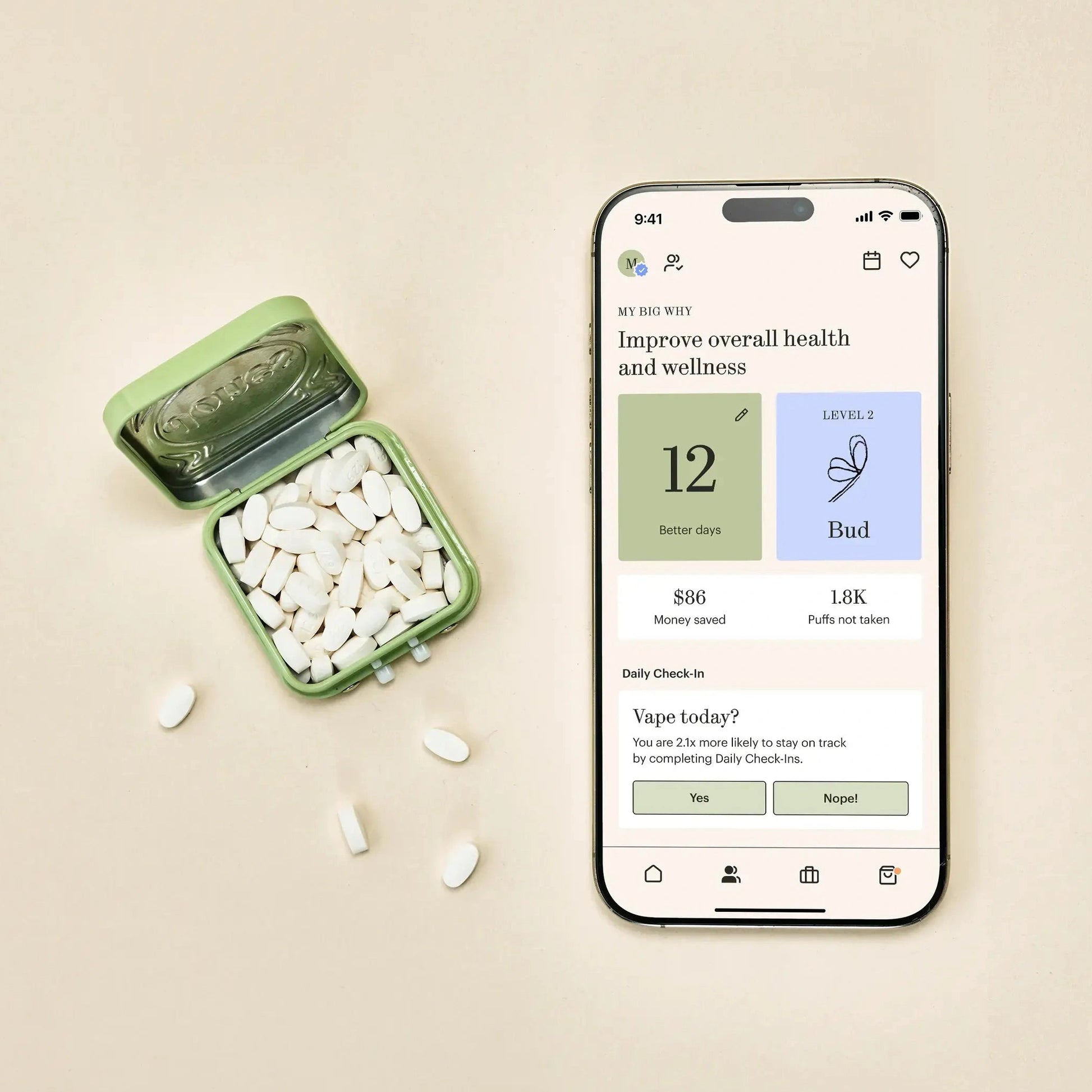 Five green boxes labeled "Jones Habit Kicker" are stacked geometrically on a beige background. Three white lozenges, part of this nicotine quit kit, are displayed in front. The boxes have minimalist text and icons.