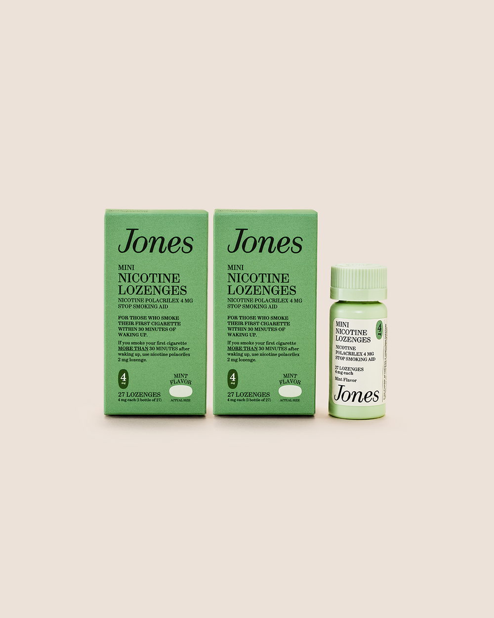 Two green Quit with Jones Kickstart Kit boxes and one matching bottle are arranged side by side on a beige background. The product labels display black text highlighting the mint flavor and usage information, along with icons for dosage and lozenge count on each box. As part of your quitting essentials, the Kickstart Kit from Quit with Jones offers effective behavioral support to help you stay on track.